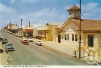 <span class="caption-caption">Goondoon Street, showing Post Office, Gladstone</span>, c1960. <br />Postcard folder by <span class="caption-publisher">Murray Views Pty Ltd</span>, collection of <span class="caption-contributor">Centre for the Government of Queensland</span>.