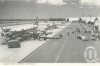 <span class="caption-caption">Eagle Farm Airport</span>, 1964. <br />Postcard folder by <span class="caption-publisher">John Sands Pty Ltd</span>, collection of <span class="caption-contributor">Centre for the Government of Queensland</span>.