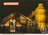 <span class="caption-caption">House of Bottles and The Big Stubby, Tewantin</span>, c1962. <br />Postcard folder by <span class="caption-publisher">Bernard Kuskopf</span>, collection of <span class="caption-contributor">Centre for the Government of Queensland</span>.