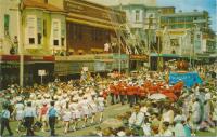 <span class="caption-caption">The parade, Carnival of Flowers, Ruthven Street, Toowoomba</span>, c1964. <br />Postcard by <span class="caption-publisher">Murray Views Pty Ltd</span>, collection of <span class="caption-contributor">Centre for the Government of Queensland</span>.