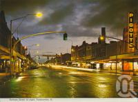 <span class="caption-caption">Ruthven Street at night, Toowoomba</span>, c1965. <br />Postcard folder by <span class="caption-publisher">Murray Views Pty Ltd</span>, collection of <span class="caption-contributor">Centre for the Government of Queensland</span>.
