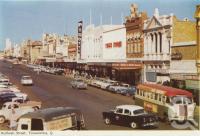 <span class="caption-caption">Ruthven Street, Toowoomba</span>, c1960. <br />Postcard folder by <span class="caption-publisher">Murray Views Pty Ltd</span>, collection of <span class="caption-contributor">Centre for the Government of Queensland</span>.