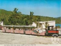 <span class="caption-caption">The Hayman Island train, Hayman Island, Great Barrier Reef</span>, 1975. <br />Postcard folder by <span class="caption-publisher">Murray Views Pty Ltd</span>, collection of <span class="caption-contributor">Centre for the Government of Queensland MS</span>.