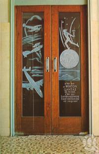 <span class="caption-caption">Qantas Memorial Doors, North Gregory Hotel, Winton</span>, c1960. <br />Postcard folder by <span class="caption-publisher">Murray Views Pty Ltd</span>, collection of <span class="caption-contributor">Centre for the Government of Queensland MS</span>.