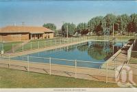 <span class="caption-caption">Swimming baths, Winton</span>, c1960. <br />Postcard folder by <span class="caption-publisher">Murray Views Pty Ltd</span>, collection of <span class="caption-contributor">Centre for the Government of Queensland MS</span>.