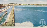 <span class="caption-caption">Looking across the evaporation pans to the salt works, Bowen</span>, c1955. <br />Postcard folder by <span class="caption-publisher">Sydney G Hughes Pty Ltd</span>, collection of <span class="caption-contributor">Centre for the Government of Queensland MS</span>.
