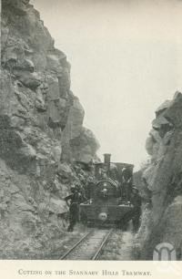 <span class="caption-caption">Cutting on the Stannary Hills Tramway</span>. <br />From <span class="caption-book">Tours in the Cairns District, Handbook to Cairns and Hinterland</span>, <span class="caption-creator">Queensland Railways</span>, Brisbane, 1912, collection of <span class="caption-contributor">Centre for the Government of Queensland</span>.