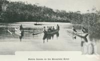 <span class="caption-caption">Native canoes' on the Bloomfield River</span>. <br />From <span class="caption-book">Australia Unlimited</span>, <span class="caption-creator">Edwin J Brady</span>, <span class="caption-publisher">George Robertson & Co</span>, Melbourne, 1918, collection of <span class="caption-contributor">Centre for the Government of Queensland</span>.