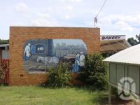 <span class="caption-caption">Alpha bakery mural</span>, 2009. <br />Digital image, collection of <span class="caption-contributor">Centre for the Government of Queensland MS</span>.