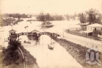 <span class="caption-caption">Toowong railway station during flood</span>, 1893. <br />Photograph, collection of <span class="caption-contributor">Fryer Library, UQ</span>.