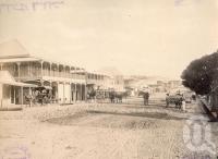 <span class="caption-caption">Charlotte Street Cooktown</span>, 1890. <br />Photograph, collection of <span class="caption-contributor">Richardson Collection, Fryer Library, UQ</span>.