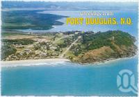 <span class="caption-caption">Aerial view looking west showing the township and Island Point, Port Douglas, Captain Cook Highway</span>, c1970-2000. <br />Postcard, collection of <span class="caption-contributor">Murray Views Collection</span>.