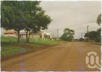 <span class="caption-caption">Looking south down the main street of Bamaga, Cape York Peninsula</span>, c1970-2000. <br />Postcard, collection of <span class="caption-contributor">Murray Views Collection</span>.