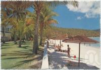 <span class="caption-caption">The front lawns and beach featuring Blue Lagoon, Royal Hayman Hotel, Hayman Island</span>, c1970-2000. <br />Postcard, collection of <span class="caption-contributor">Murray Views Collection</span>.