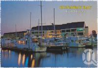 <span class="caption-caption">Evening approaches over the Runaway Bay Marina</span>, c1970-2000. <br />Postcard, collection of <span class="caption-contributor">Murray Views Collection</span>.