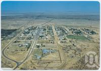 <span class="caption-caption">Aerial view, Julia Creek</span>, c1970-2000. <br />Postcard, collection of <span class="caption-contributor">Murray Views Collection</span>.
