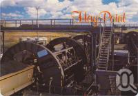 <span class="caption-caption">The Rotary Tipper unloads two 56 tonne wagon loads of coal every 120 seconds.  The coal trains consist of 148 wagons and are hauled by six 96 tonne locos, Hay Point</span>, c1970-2000. <br />Postcard, collection of <span class="caption-contributor">Murray Views Collection</span>.