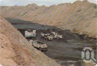 <span class="caption-caption">Coal face from high wall, Saraji Coalmine, Dysart</span>, c1970-2000. <br />Postcard, collection of <span class="caption-contributor">Murray Views Collection</span>.