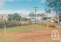 <span class="caption-caption">Flower garden and main street, Mt Garnet</span>, c1970-2000. <br />Postcard, collection of <span class="caption-contributor">Murray Views Collection</span>.