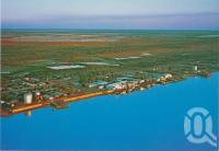 <span class="caption-caption">Aerial view of Karumba</span>, c1970-2000. <br />Postcard, collection of <span class="caption-contributor">Murray Views Collection</span>.