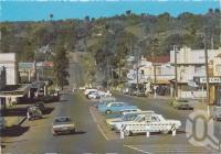 <span class="caption-caption">Looking east along Drayton Street, Nanango</span>, c1970-2000. <br />Postcard, collection of <span class="caption-contributor">Murray Views Collection</span>.