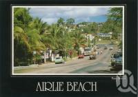 <span class="caption-caption">Main street, Airlie Beach</span>, c1985. <br />Postcard by <span class="caption-publisher">Peer Productions</span>, collection of <span class="caption-contributor">Centre for the Government of Queensland</span>.