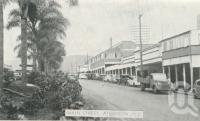 <span class="caption-caption">Main street, Atherton</span>, c1945. <br />Postcard folder by <span class="caption-publisher">Murray Views Pty Ltd</span>, collection of <span class="caption-contributor">Centre for the Government of Queensland</span>.