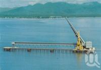 <span class="caption-caption">The sugar wharf, Lucinda</span>, c1975. <br />Postcard by <span class="caption-publisher">Murray Views Pty Ltd</span>, collection of <span class="caption-contributor">Centre for the Government of Queensland</span>.