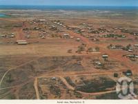 <span class="caption-caption">Aerial view, Normanton</span>, c1983. <br />Postcard folder by <span class="caption-publisher">Murray Views Pty Ltd</span>, collection of <span class="caption-contributor">Centre for the Government of Queensland</span>.