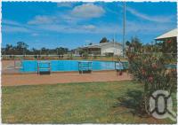 <span class="caption-caption">Swimming Pool with Bowls Clubhouse in background, Yarraman</span>, c1970-2000. <br />Postcard, collection of <span class="caption-contributor">Murray Views Collection</span>.