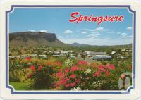 <span class="caption-caption">Springsure, nestled into its mountain backdrop</span>, c1970-2000. <br />Postcard, collection of <span class="caption-contributor">Murray Views Collection</span>.