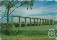<span class="caption-caption">The Traffic Bridge and Weir on the Balonne River, St George</span>, c1970-2000. <br />Postcard, collection of <span class="caption-contributor">Murray Views Collection</span>.