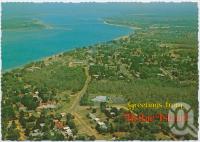 <span class="caption-caption">Aerial view of Bangaree and Bellara, featuring the Pumicestone Passage and the Bribie Bridge, Bribie Island</span>, c1970-2000. <br />Postcard, collection of <span class="caption-contributor">Murray Views Collection</span>.